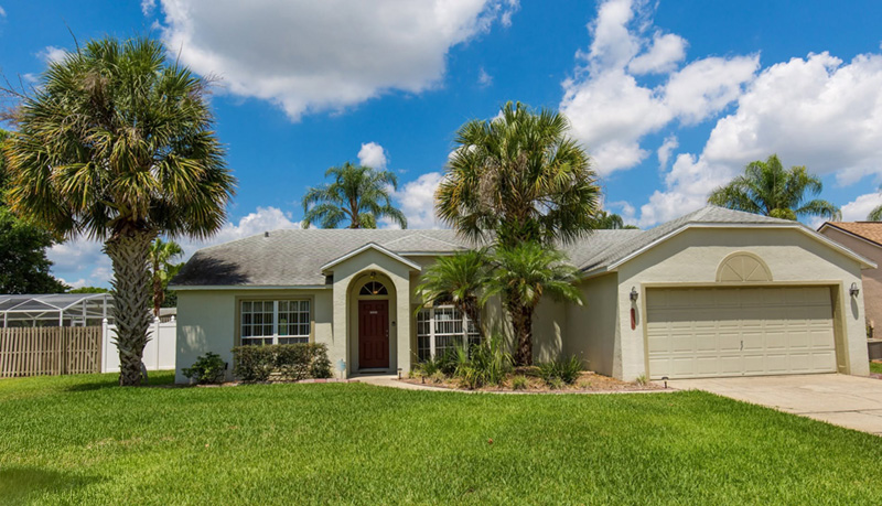 Front exterior and lawn at Florida Fun Villa Front exterior and lawn at Florida Fun Villa